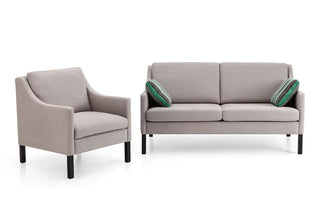 Sofa/Sessel Nele - Platzsparend, da reduziert in der Form - auf hohen Beinen stehend und somit angenehm komfortabel in der Sitzhöhe