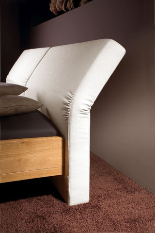 Massivholzbett Corso, Detail verstellbares Komfort-Polsterkopfteil mit textilem Bezug